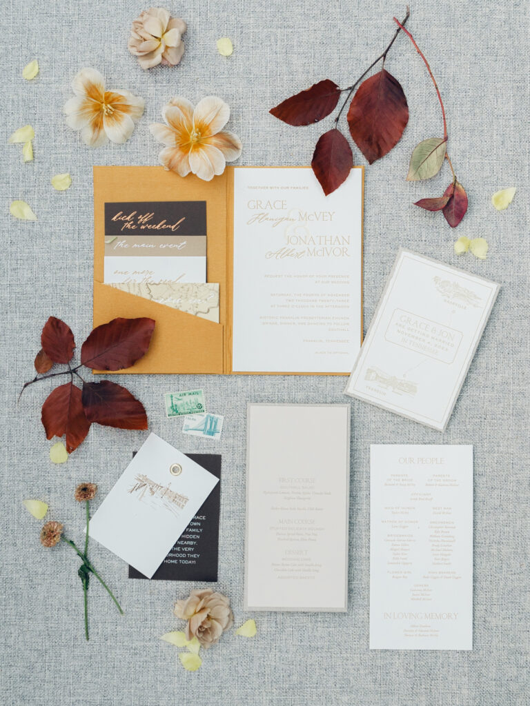 Unique and classic fall wedding in Tennessee countryside. Wedding colors of caramel, honey, dusty rose, and burgundy make perfect fall wedding florals. Roses, ranunculus, wildflowers, and fall foliage invite warm tones for outdoor fall wedding outside Nashville, TN. Design by Rosemary & Finch Floral Design in Nashville, TN. 