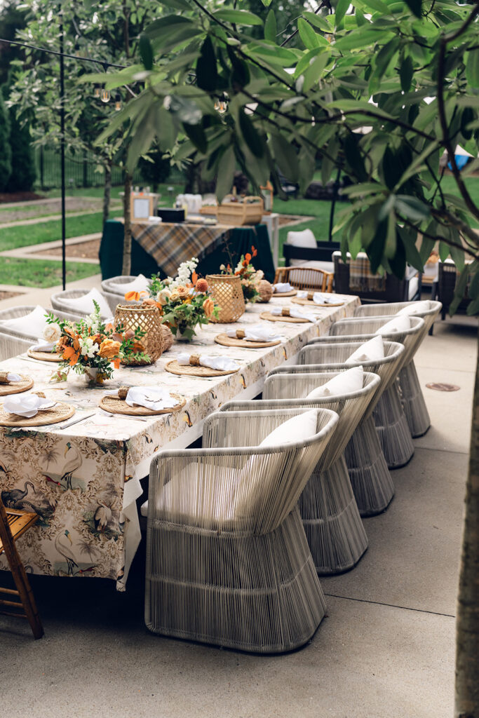 Bridesmaids luncheon florals for fall wedding. Fall floral colors in rust, burgundy, sage, cream, and copper. Charming outdoor dinner party for fall wedding. Accent centerpieces in ceramic vases decorate fall wedding bridal shower in Nashville, Tennessee. Design by Rosemary & Finch Floral Design in Nashville, TN. 