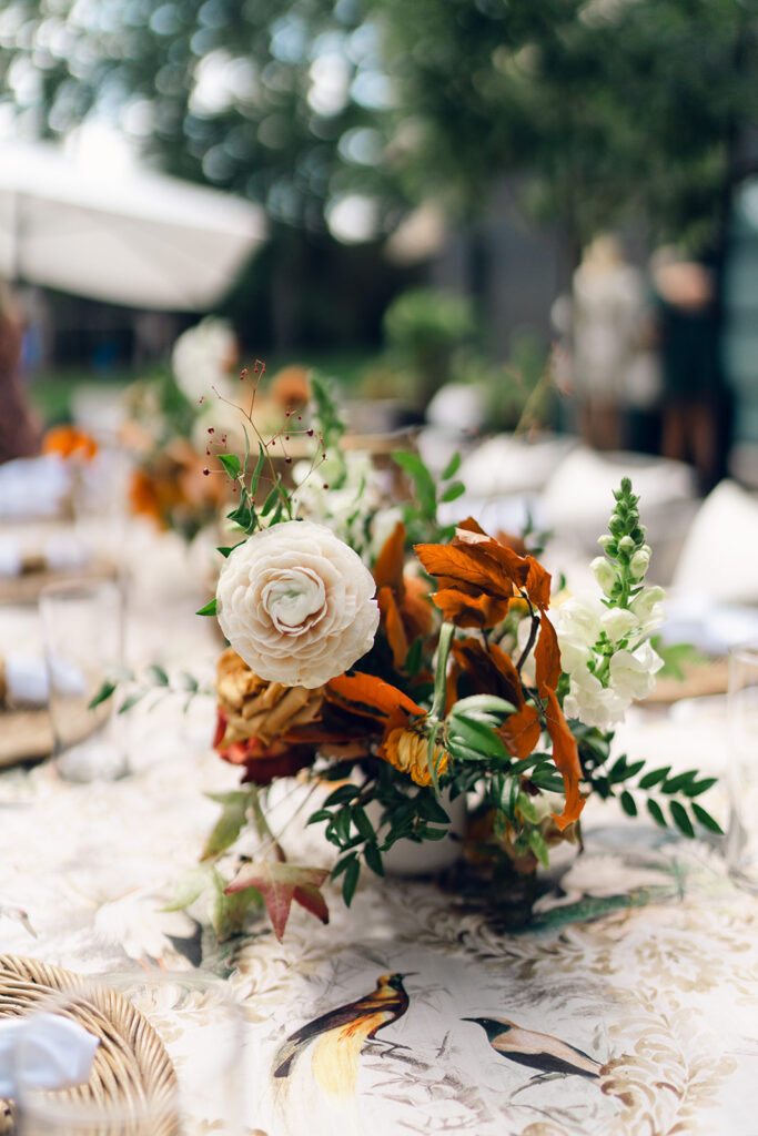 Bridesmaids luncheon florals for fall wedding. Fall floral colors in rust, burgundy, sage, cream, and copper. Charming outdoor dinner party for fall wedding. Accent centerpieces in ceramic vases decorate fall wedding bridal shower in Nashville, Tennessee. Design by Rosemary & Finch Floral Design in Nashville, TN. 