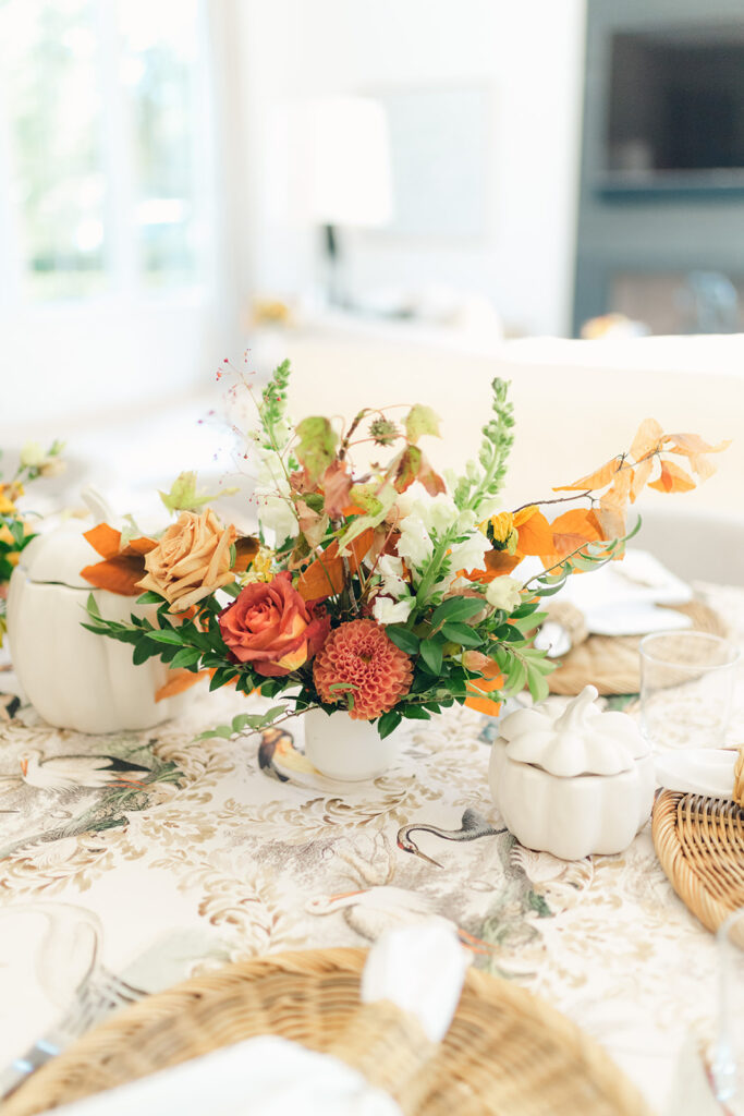 Bridesmaids luncheon florals for fall wedding. Fall floral colors in rust, burgundy, sage, cream, and copper. Charming outdoor dinner party for fall wedding. Accent centerpieces in ceramic vases decorate fall wedding bridal shower in Nashville, Tennessee. Design by Rosemary & Finch Floral Design in Nashville, TN. 