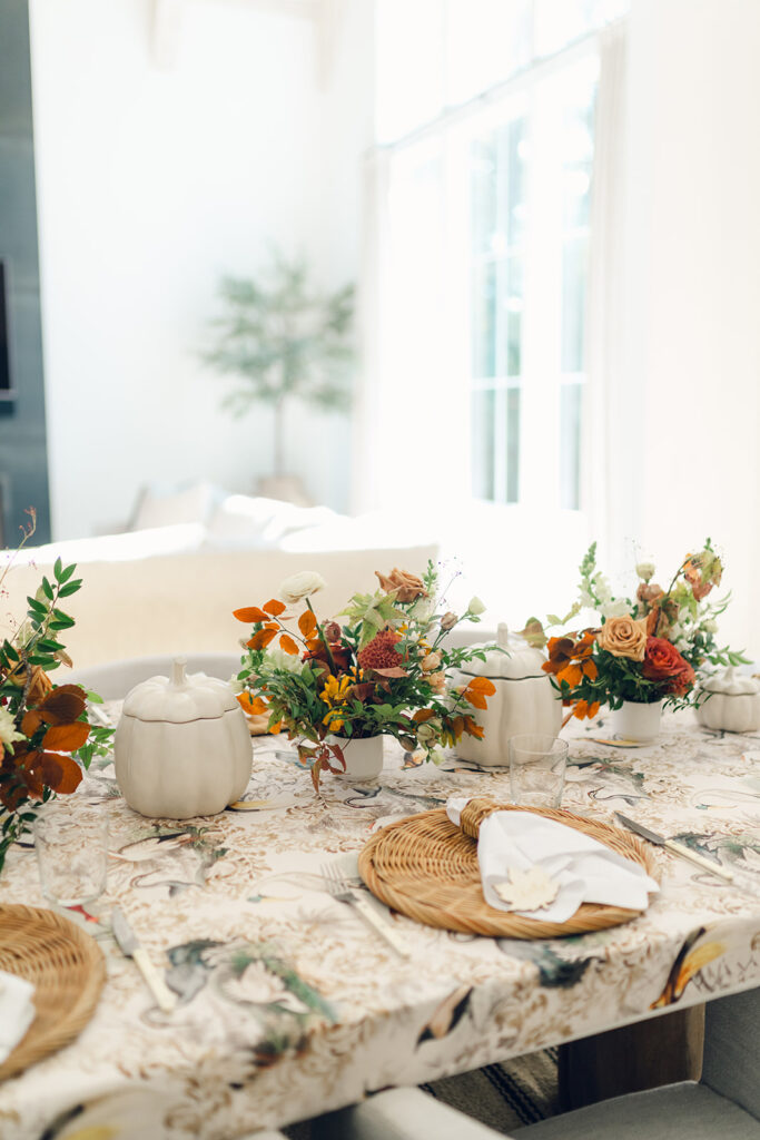 Bridesmaids luncheon florals for fall wedding. Fall floral colors in rust, burgundy, sage, cream, and copper. Charming outdoor dinner party for fall wedding. Accent centerpieces in ceramic vases decorate fall wedding bridal shower in Nashville, Tennessee. Design by Rosemary & Finch Floral Design in Nashville, TN. 