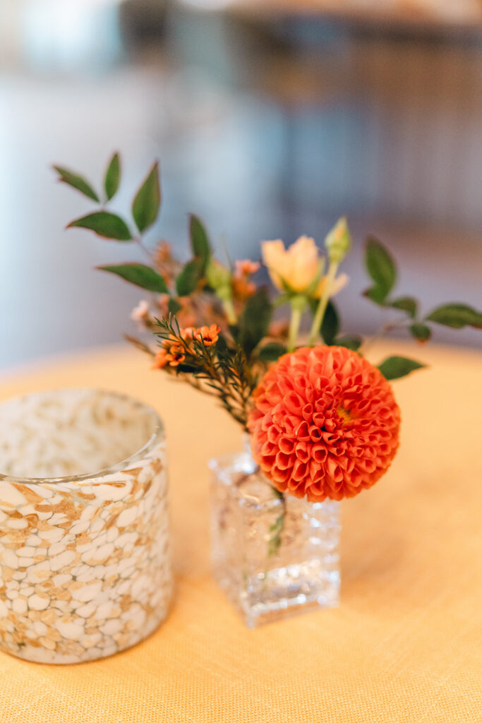 Wedding welcome party florals for fall wedding. Fall floral colors in rust, burgundy, sage, cream, and copper. Charming boho style party at Soho House Nashville. Accent centerpieces in ceramic vessels and glass bud vases decorate fall wedding welcome party in Nashville, Tennessee. Design by Rosemary & Finch Floral Design in Nashville, TN. 