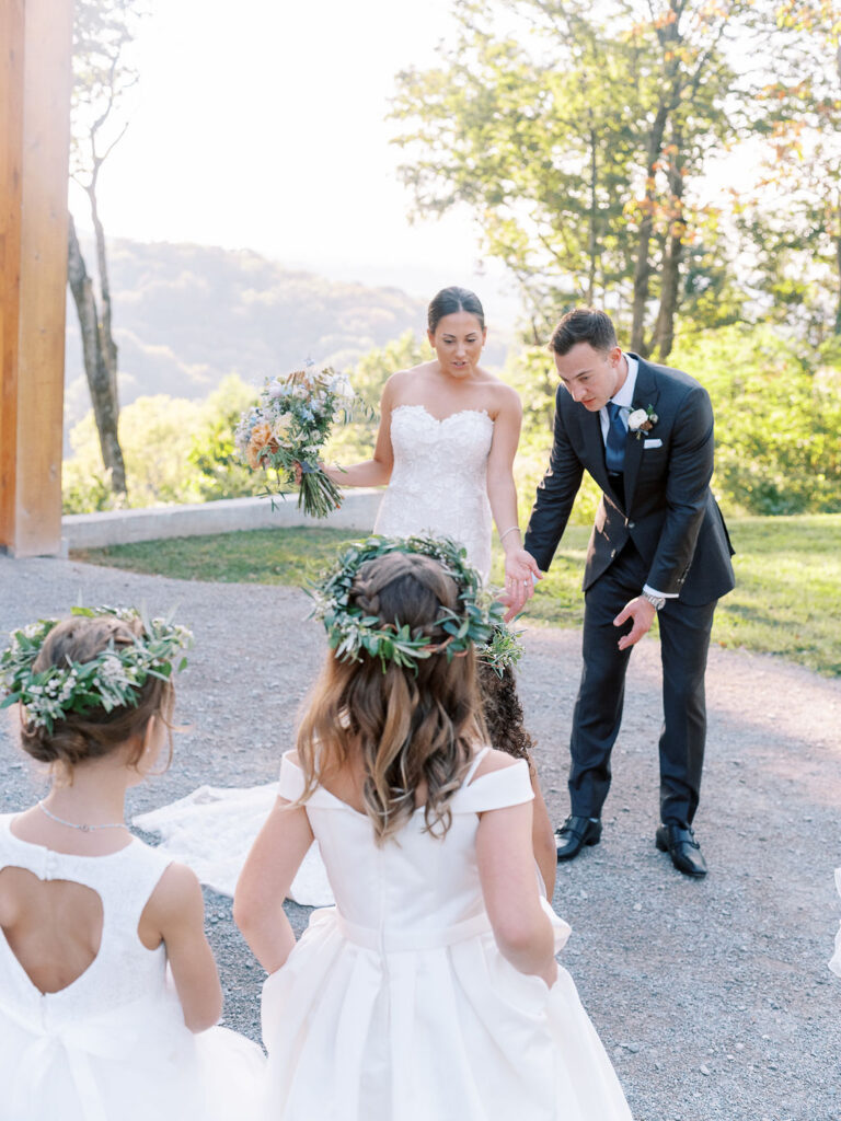 Dainty floral crowns for flower girls. Greenery and floral accents for flower girl crowns. Soft whimsical floral design for unique fall wedding design. Fall wedding color palette in brown, soft blue, dusty rose, and muted greens. Design by Rosemary & Finch Floral Design in Nashville, TN. 