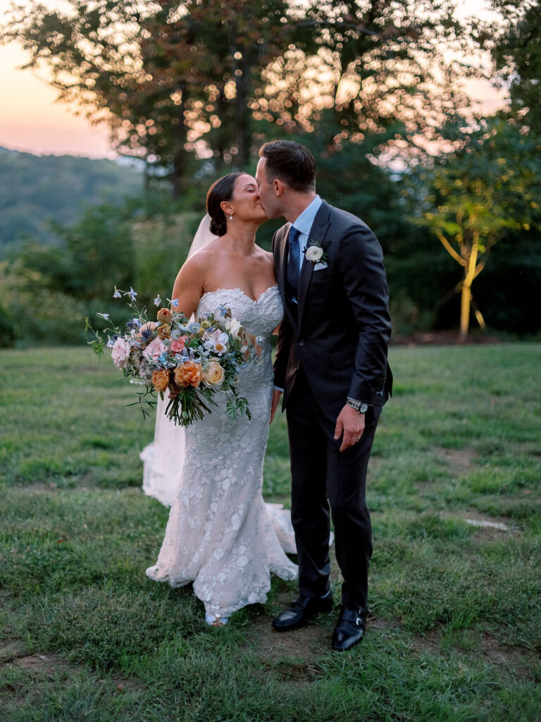 Whimsical bridal bouquet for fall Tennessee wedding. Soft whimsical floral design for unique fall wedding design. Fall wedding color palette in brown, soft blue, dusty rose, and muted greens. Whimsical florals featuring dried hydrangeas, tulips, delphinium, and grasses. Design by Rosemary & Finch Floral Design in Nashville, TN. 