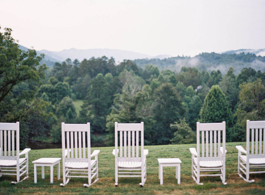 Fall wedding at Blackberry Farm. Garden inspired floral design with elegant design choices for fall wedding weekend. Lush fall florals featuring roses, dahlias, zinnias, smokebush, and natural greenery. Destination wedding in the Smoky Mountains at Blackberry Farms. Destination floral design for whimsical and romantic weddings in cream and blush tones. Design by Rosemary & Finch Floral Design in Nashville, TN. 