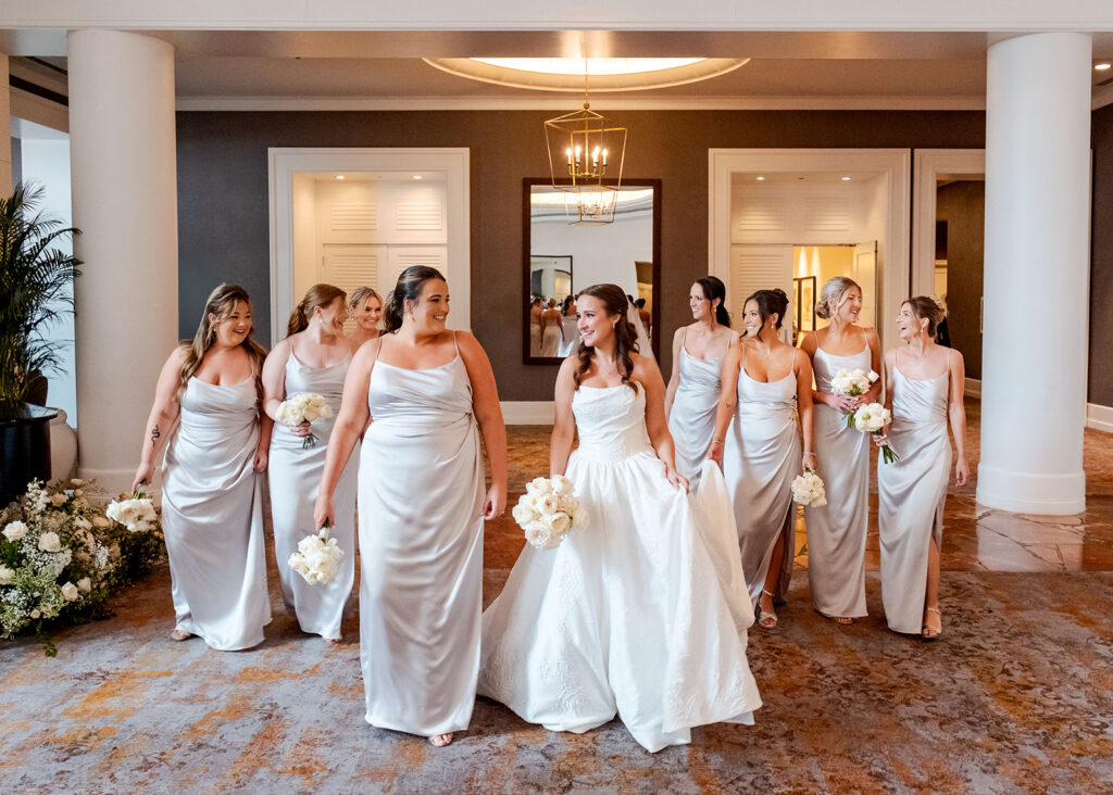 Editorial, modern bridal bouquet with white playa blanca and cloud garden roses and white peonies. Soft, romantic and timeless floral design for Atlanta wedding in Buckhead. Elegant, all-white wedding flowers in a luxury setting. Design by Rosemary & Finch Floral Design in Nashville, TN.