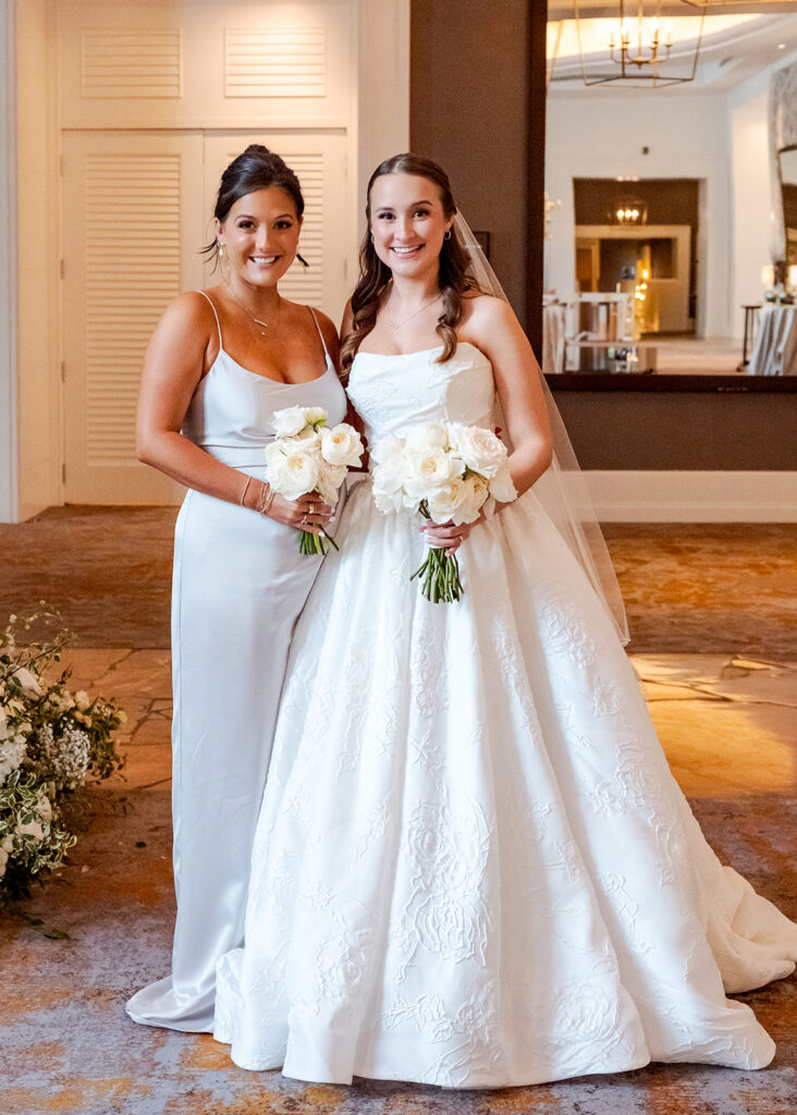 Editorial, modern bridal bouquet with white playa blanca and cloud garden roses and white peonies. Soft, romantic and timeless floral design for Atlanta wedding in Buckhead. Elegant, all-white wedding flowers in a luxury setting. Design by Rosemary & Finch Floral Design in Nashville, TN.