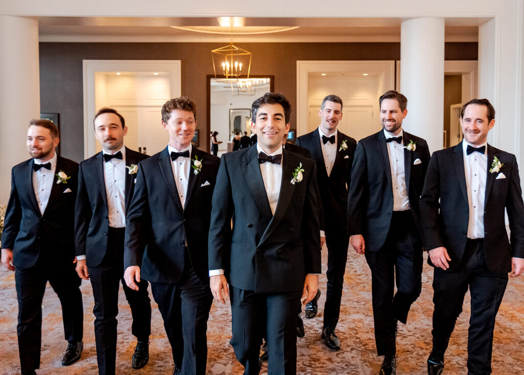 Editorial, modern bridal bouquet with white playa blanca and cloud garden roses and white peonies. Soft, romantic and timeless floral design for Atlanta wedding in Buckhead. Elegant, all-white wedding flowers in a luxury setting. Design by Rosemary & Finch Floral Design in Nashville, TN.