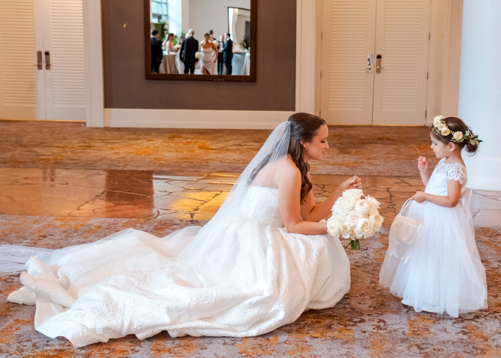 Editorial, modern bridal bouquet with white playa blanca and cloud garden roses and white peonies. Soft, romantic and timeless floral design for Atlanta wedding in Buckhead. Elegant, all-white wedding flowers in a luxury setting. Design by Rosemary & Finch Floral Design in Nashville, TN.