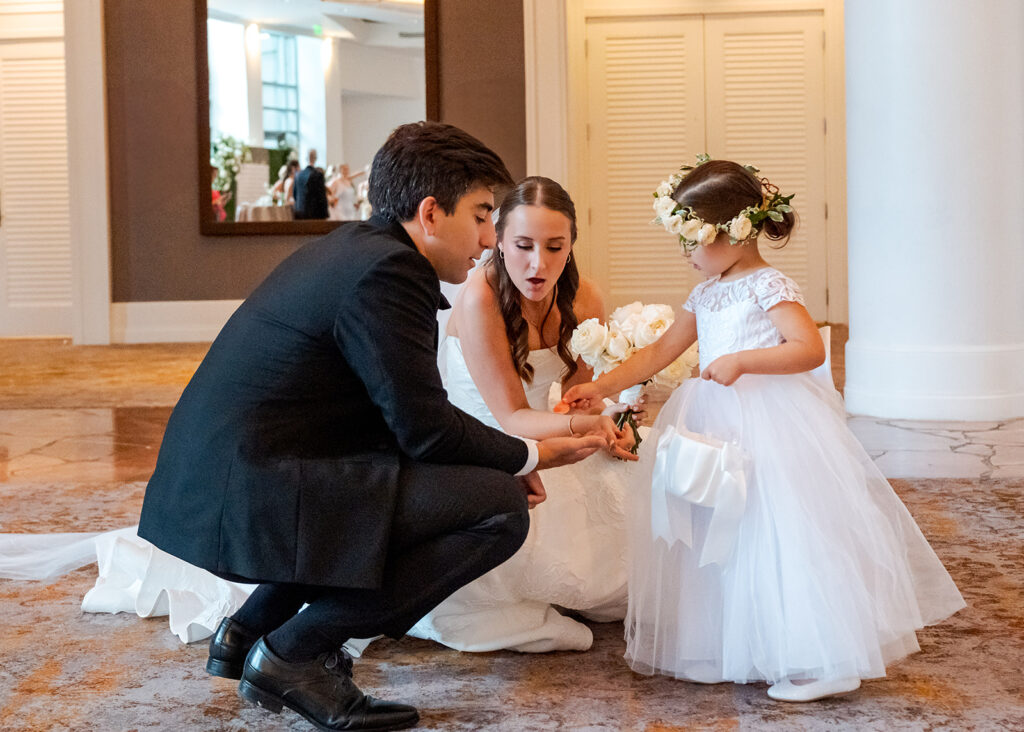 Editorial, modern bridal bouquet with white playa blanca and cloud garden roses and white peonies. Soft, romantic and timeless floral design for Atlanta wedding in Buckhead. Elegant, all-white wedding flowers in a luxury setting. Design by Rosemary & Finch Floral Design in Nashville, TN.