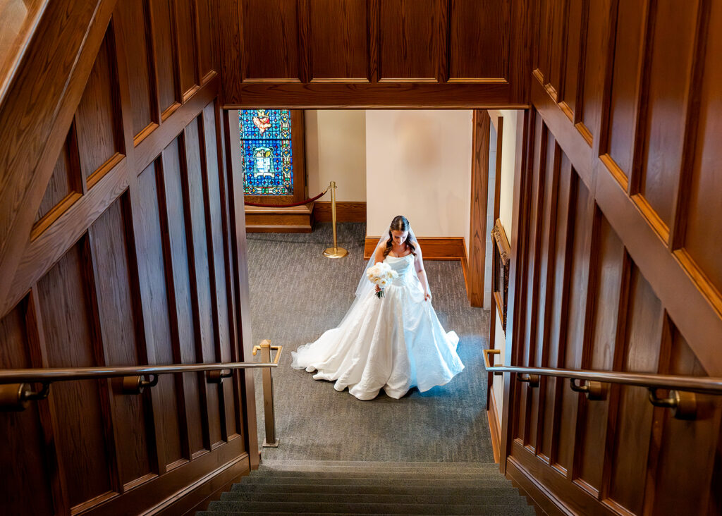 Editorial, modern bridal bouquet with white playa blanca and cloud garden roses and white peonies. Soft, romantic and timeless floral design for Atlanta wedding in Buckhead. Elegant, all-white wedding flowers in a luxury setting. Design by Rosemary & Finch Floral Design in Nashville, TN.
