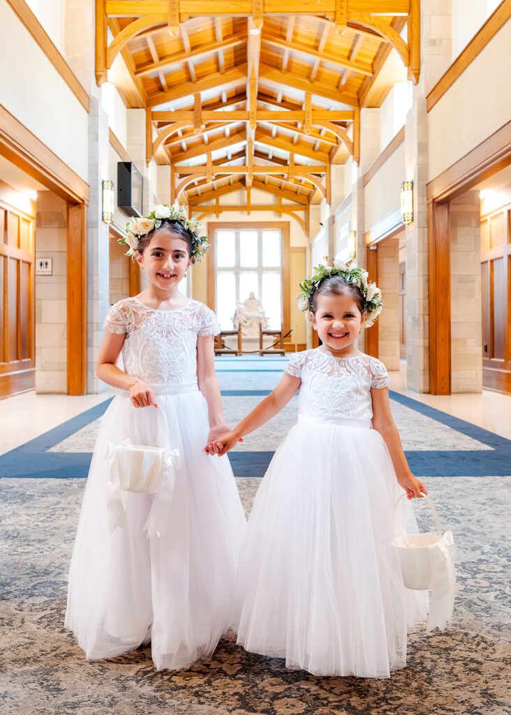 Editorial, modern bridal bouquet with white playa blanca and cloud garden roses and white peonies. Soft, romantic and timeless floral design for Atlanta wedding in Buckhead. Elegant, all-white wedding flowers in a luxury setting. Design by Rosemary & Finch Floral Design in Nashville, TN.