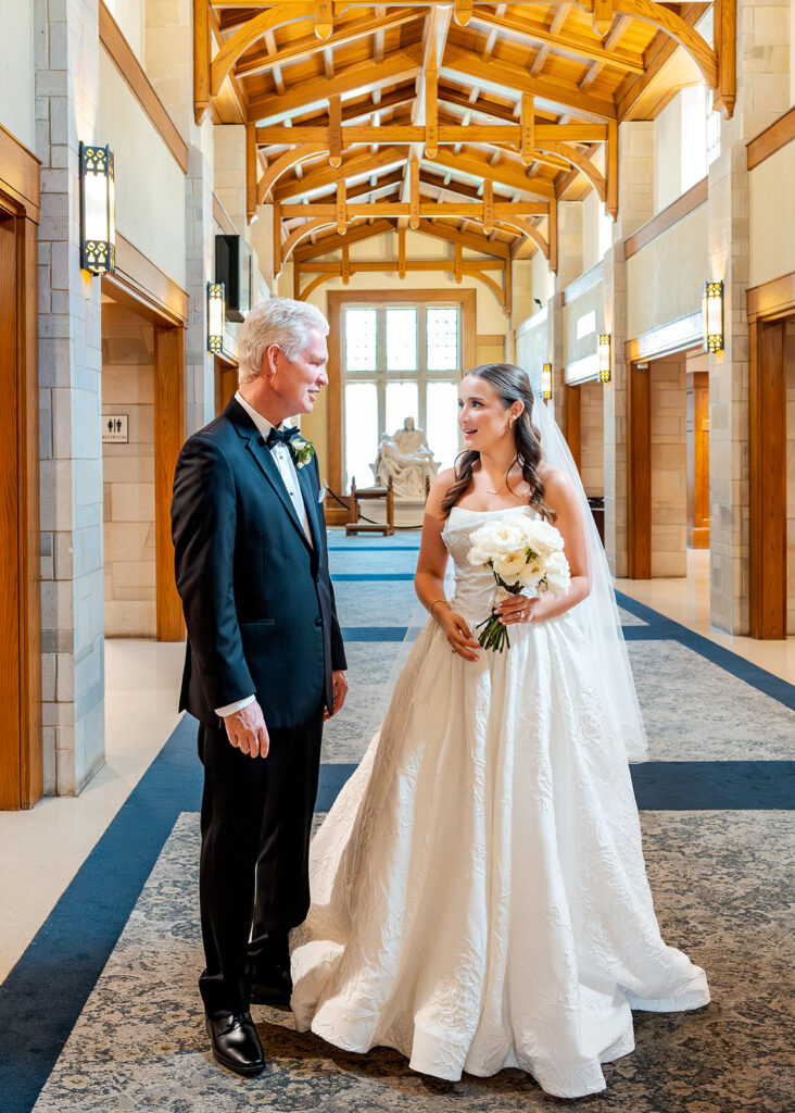 Editorial, modern bridal bouquet with white playa blanca and cloud garden roses and white peonies. Soft, romantic and timeless floral design for Atlanta wedding in Buckhead. Elegant, all-white wedding flowers in a luxury setting. Design by Rosemary & Finch Floral Design in Nashville, TN.
