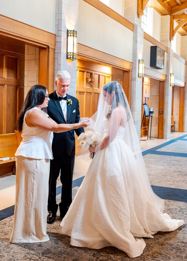 Editorial, modern bridal bouquet with white playa blanca and cloud garden roses and white peonies. Soft, romantic and timeless floral design for Atlanta wedding in Buckhead. Elegant, all-white wedding flowers in a luxury setting. Design by Rosemary & Finch Floral Design in Nashville, TN.