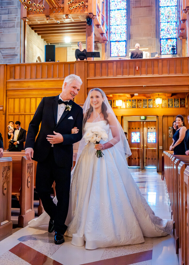 Editorial, modern bridal bouquet with white playa blanca and cloud garden roses and white peonies. Soft, romantic and timeless floral design for Atlanta wedding in Buckhead. Elegant, all-white wedding flowers in a luxury setting. Design by Rosemary & Finch Floral Design in Nashville, TN.