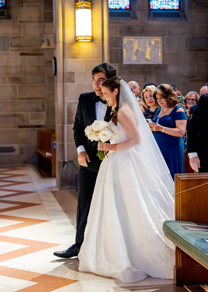 Editorial, modern bridal bouquet with white playa blanca and cloud garden roses and white peonies. Soft, romantic and timeless floral design for Atlanta wedding in Buckhead. Elegant, all-white wedding flowers in a luxury setting. Design by Rosemary & Finch Floral Design in Nashville, TN.