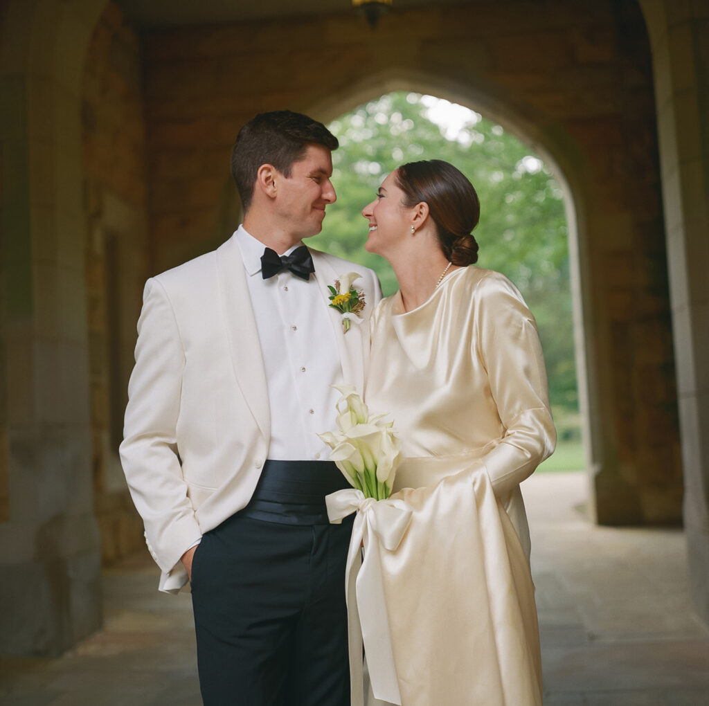 A simple and modest bouquet consisting of all white calla lilies wrapped in ivory silk. An elegant and classic touch to a beautiful summer wedding in Sewanee, TN. Design by Rosemary and Finch Floral Design in Nashville, TN. 